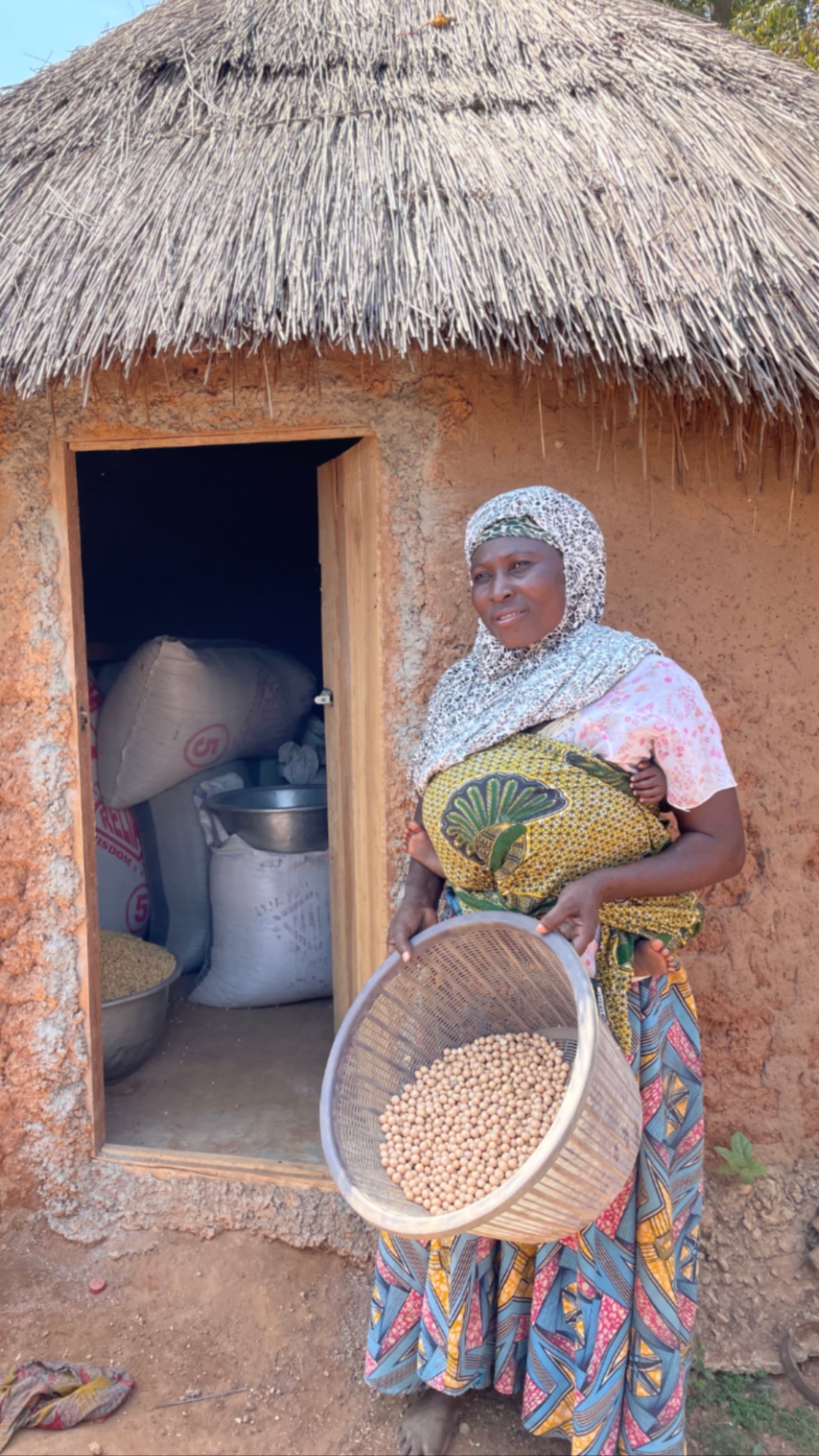 Farmer in a field of diverse crops
